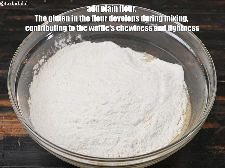 Step 8 – Add 1&frac34; cups&nbsp;<a href="https://www.tarladalal.com/glossary-plain-flour-maida-188i">plain flour (maida)</a>. The gluten in the flour develops during mixing, contributing …
