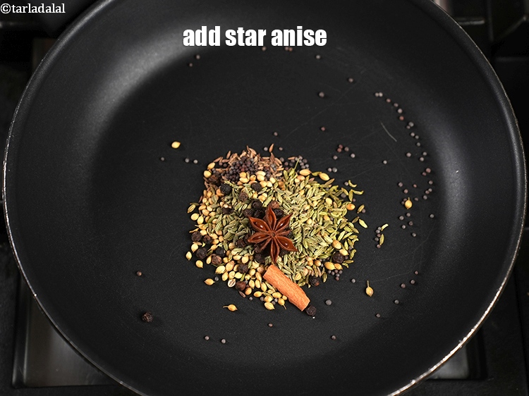 Step 9 – Add 1 small&nbsp;<a href="https://www.tarladalal.com/glossary-star-anise-chakri-phool-623i">star anise (chakri phool)</a>.