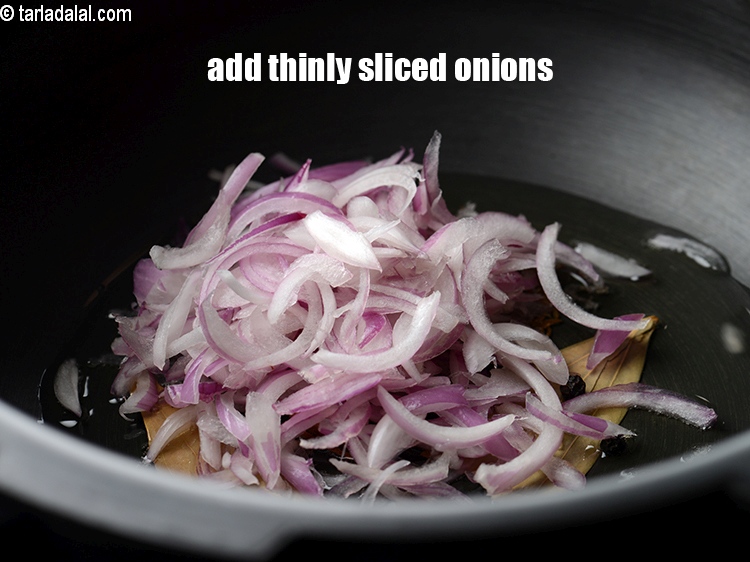 Step 9 – Add &frac12; cup thinly <a href="https://www.tarladalal.com/glossary-sliced-onions-745i">sliced onions</a>.