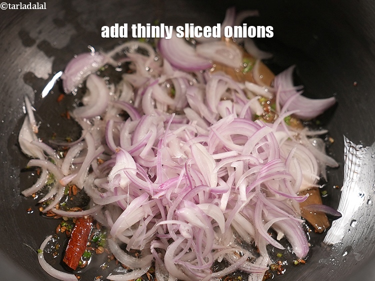 Step 9 – Add &frac12; cup thinly&nbsp;<a href="https://www.tarladalal.com/glossary-sliced-onions-745i">sliced onions</a>.