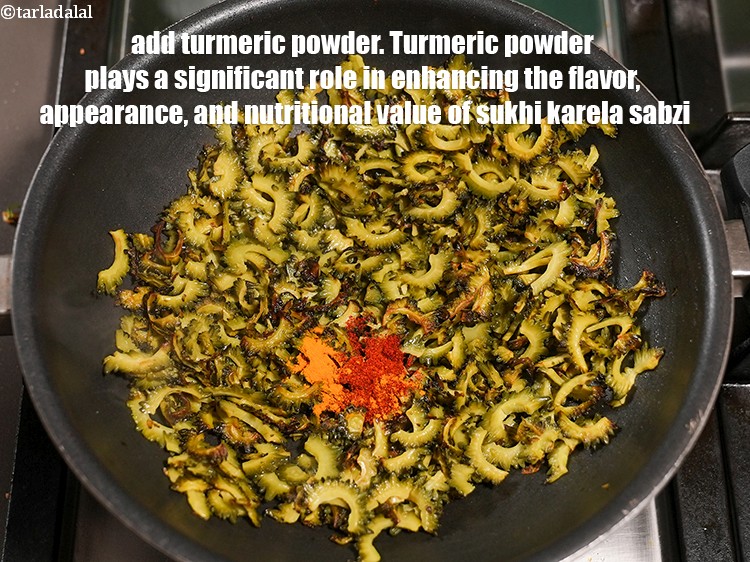 स्टेप 10 – १/४ टी-स्पून&nbsp;<a href=""https://www.tarladalal.com/glossary-turmeric-powder-haldi-hindi-645i"">हल्दी पाउडर</a>&nbsp;डालें । सुखी करेला सब्जी के स्वाद, …