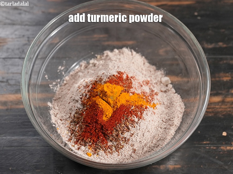 Step 9 – Add &frac14; tsp <a href="https://www.tarladalal.com/glossary-turmeric-powder-haldi-645i">turmeric powder (haldi)</a>.&nbsp;