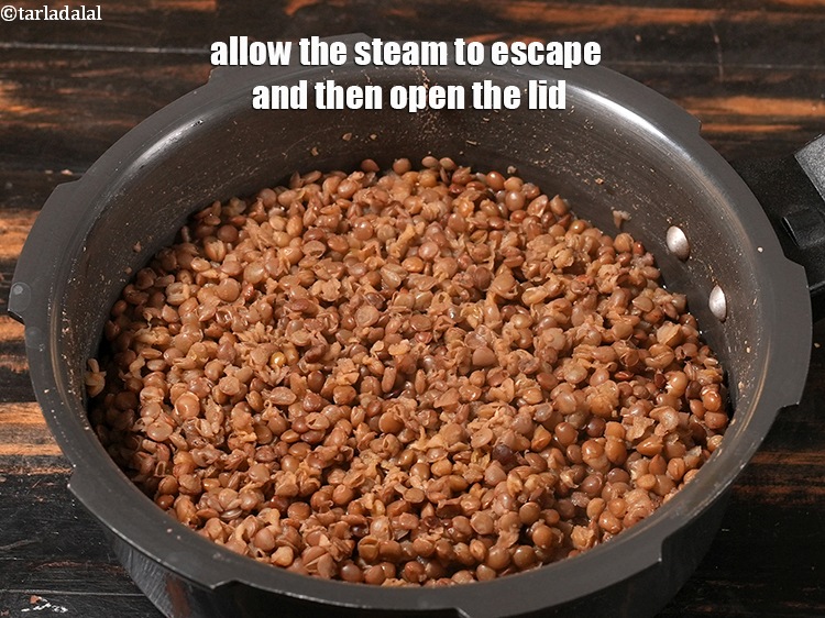 Step 9 – Allow the steam to escape and then open the lid. Keep aside.&nbsp;