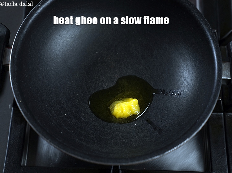 Step 9 – In the same kadhai, heat ghee on a slow flame.