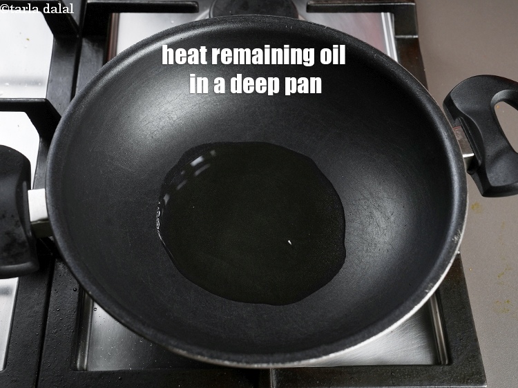 Step 14 – Heat remaining 3 tbsp oil in a deep pan.