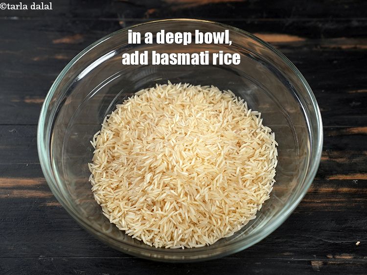 Step 9 – To make <strong>egg biryani</strong>, in a deep bowl, add 1 cup long grain basmati rice.