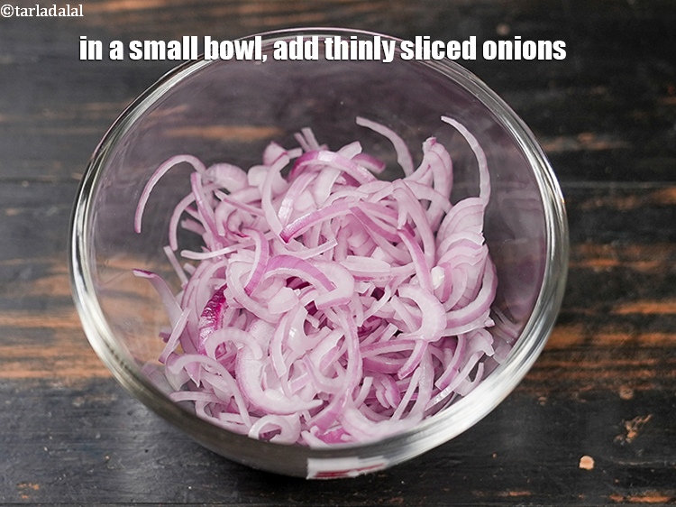 Step 9 – In a small bowl, add 1 cup thinly&nbsp;<a href="https://www.tarladalal.com/glossary-sliced-onions-745i">sliced onions</a>.&nbsp;