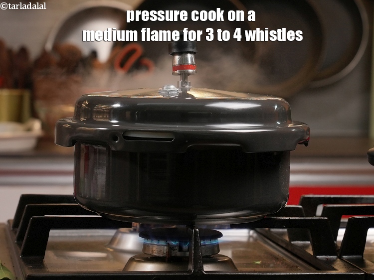 Step 9 – Pressure cook on a medium flame for 3 to 4 whistles.