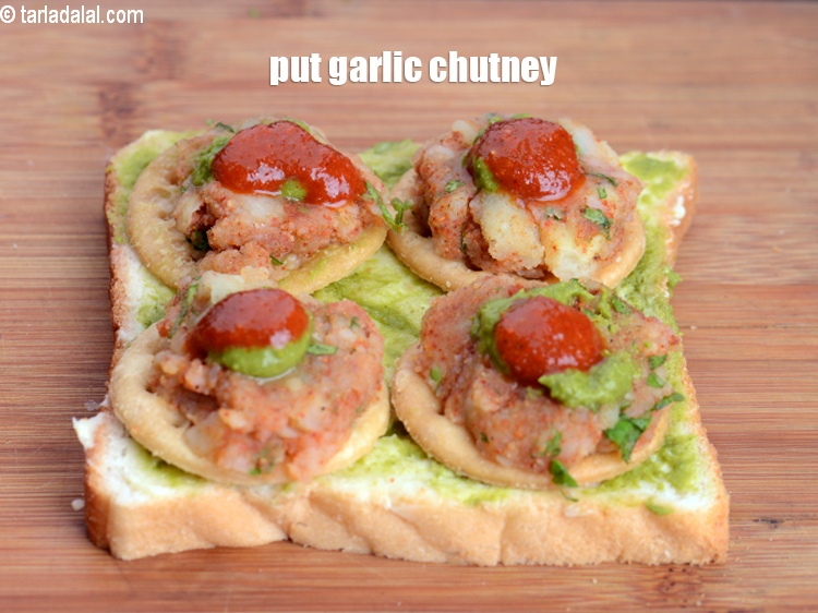 Step 10 – Put 1/8 tsp <a href="https://www.tarladalal.com/garlic-chutney-2865r">garlic chutney</a>.