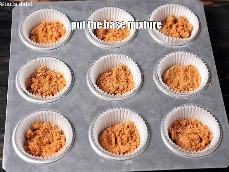 Step 10 – Put 1&frac12; tbsp of the mixture in each lined cupcake mould.