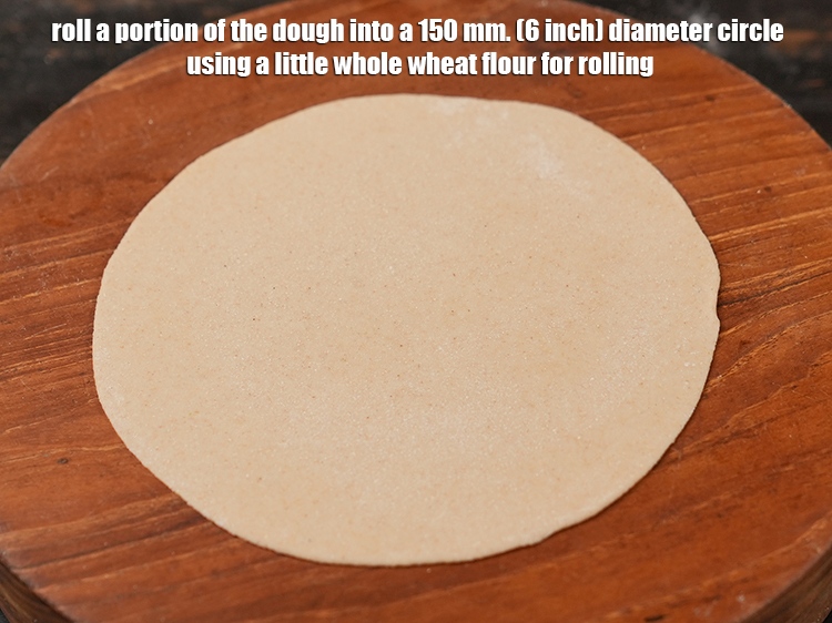 स्टेप 9 – आटे के एक भाग को थोड़े से गेहूं के आटे …