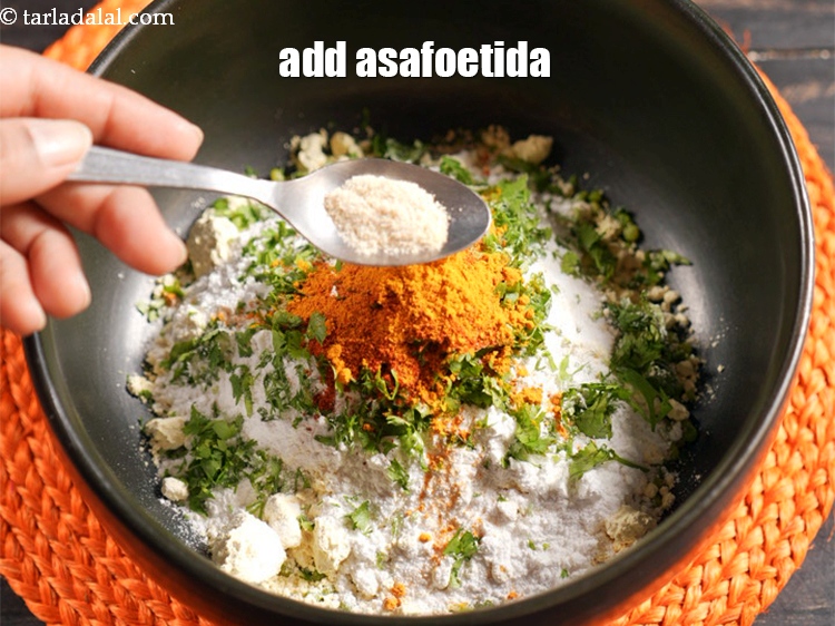 Step 9 – Add 1/4 tsp <a href="https://www.tarladalal.com/glossary-asafoetida-hing-113i">asafoetida (hing)</a>.