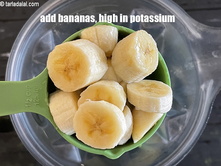 Step 9 – Add&nbsp;<meta charset="UTF-8" />1/2 cup&nbsp;roughly&nbsp;<a href="glossary-chopped-bananas-20i">chopped bananas</a>.&nbsp;Banana&nbsp;is high in&nbsp;<a href="https://www.tarladalal.com/recipes-for-Potassium-Rich-1075">potassium</a>. Potassium helps normalize the heartbeat and …