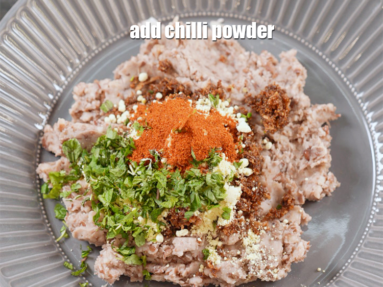 Step 13 – Add 1 tsp&nbsp;<a href="https://www.tarladalal.com/glossary-chilli-powder-red-chilli-powder-339i">chilli powder</a>.