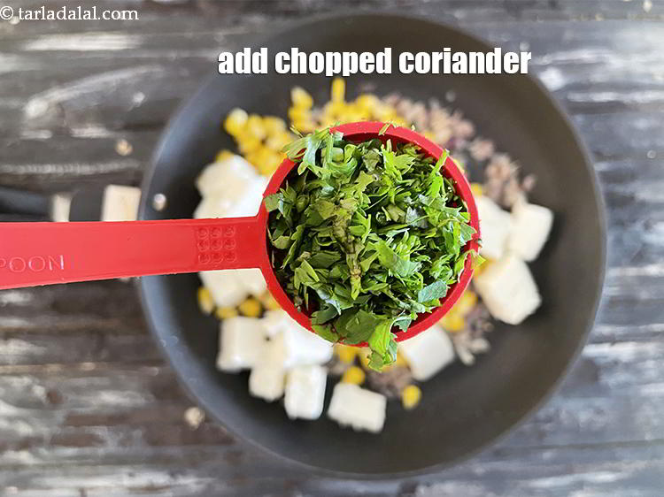 Step 9 – Add&nbsp;<meta charset="UTF-8" />2 tbsp&nbsp;<a href="glossary-chopped-coriander-783i">chopped coriander (dhania)</a>.