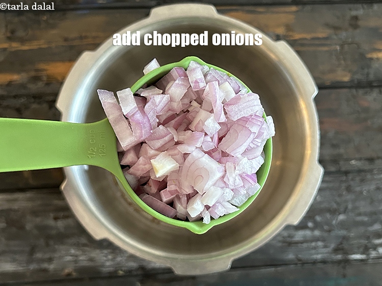 Step 9 – Add&nbsp;<meta charset="UTF-8" />1/2 cup&nbsp;<a href="glossary-chopped-onions-722i">chopped onions</a>.