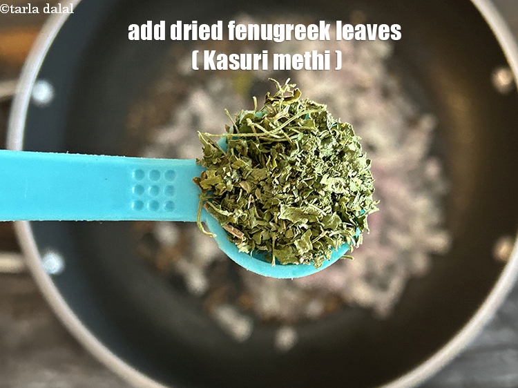 Step 13 – Add&nbsp;<meta charset="UTF-8" />1/2 tsp&nbsp;<a href="glossary-dried-fenugreek-leaves-kasuri-methi-374i">dried fenugreek leaves (kasuri methi)</a>.