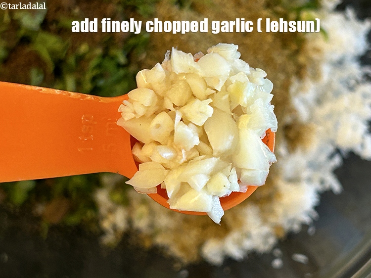 Step 15 – Add 1&nbsp;tbsp finely <a href="https://www.tarladalal.com/glossary-chopped-garlic-790i">chopped garlic (lehsun)</a>.&nbsp;Garlic imparts a pungent, savory, and slightly sweet flavor …