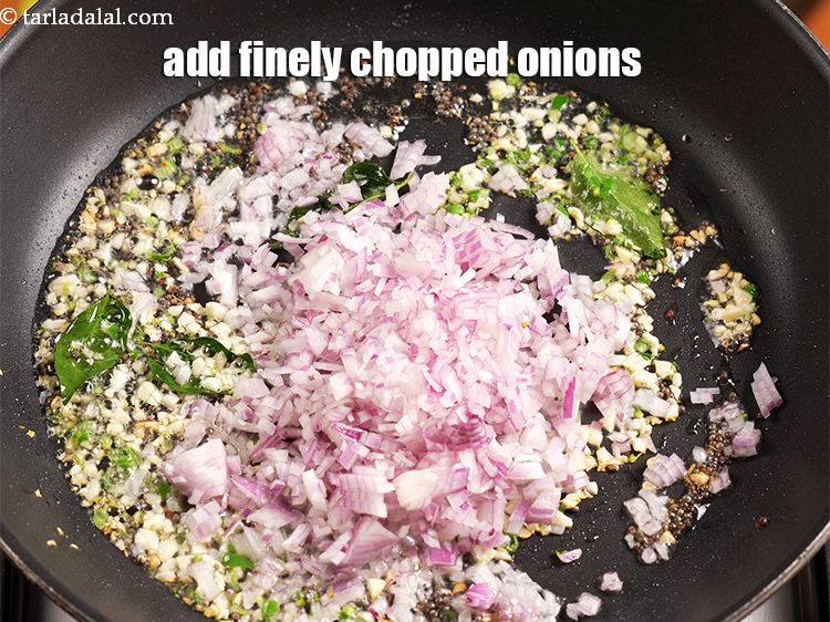 Step 9 – Add &frac12; cup finely <a href="https://www.tarladalal.com/glossary-chopped-onions-722i">chopped onions</a>.