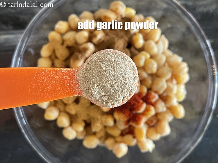 Step 20 – Add&nbsp;1 tsp&nbsp;<a href="https://tarladalal.com/glossary-garlic-powder-lehsun-ka-powder-lahsun-ka-powder-351i">garlic (lehsun) powder</a>.