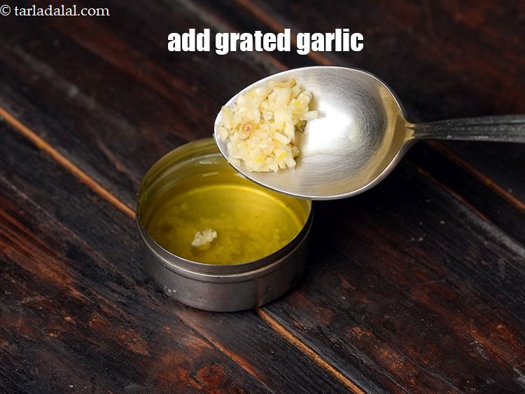 Step 9 – Add 1 tsp grated garlic.