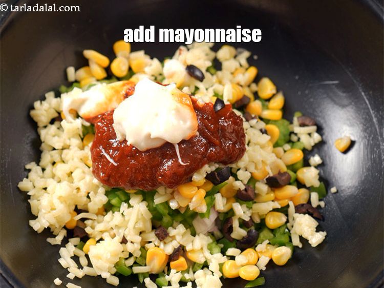 Step 9 – Add 1 tbsp <a href="https://www.tarladalal.com/glossary-mayonnaise-505i">mayonnaise</a>.
