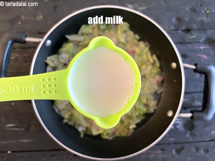 Step 9 – Add&nbsp;<meta charset="UTF-8" />1/2 cup&nbsp;<a href="glossary-milk-doodh-full-cream-milk-514i">milk</a>.