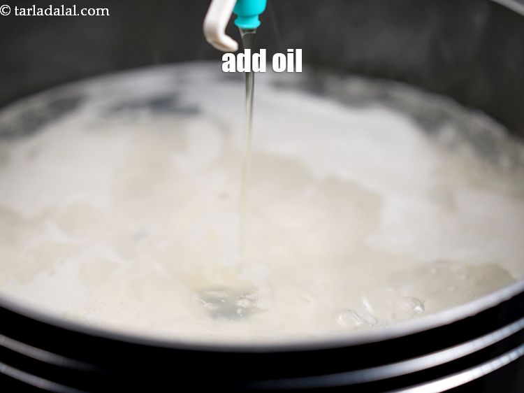 Step 10 – Add 1 tsp&nbsp;<a href="https://www.tarladalal.com/glossary-oil-671i">oil</a>.&nbsp;