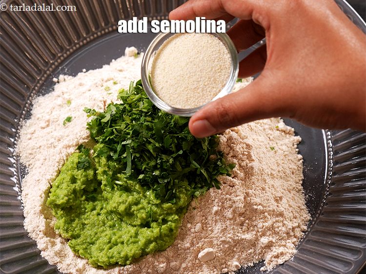 Step 9 – Add 2 tbsp&nbsp;<a href="https://www.tarladalal.com/glossary-semolina-sooji-rava-rawa-603i">semolina (rava / sooji)</a>.