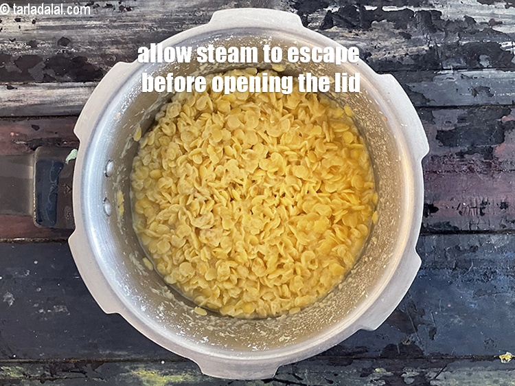 Step 9 – Allow the steam to escape before opening the lid.