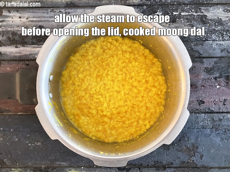 Step 22 – Allow the steam to escape before opening the lid. Keep aside.