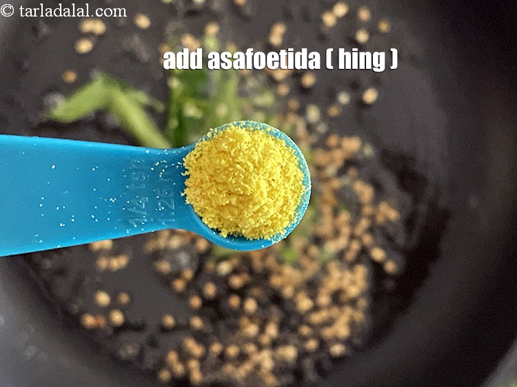 Step 52 – Add&nbsp;<meta charset="UTF-8" />1/4 tsp&nbsp;<a href="glossary-asafoetida-hing-113i">asafoetida (hing)</a>.