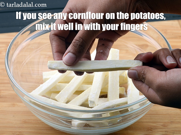 Step 16 – If you see any cornflour on the potatoes, mix it well in with your fingers.