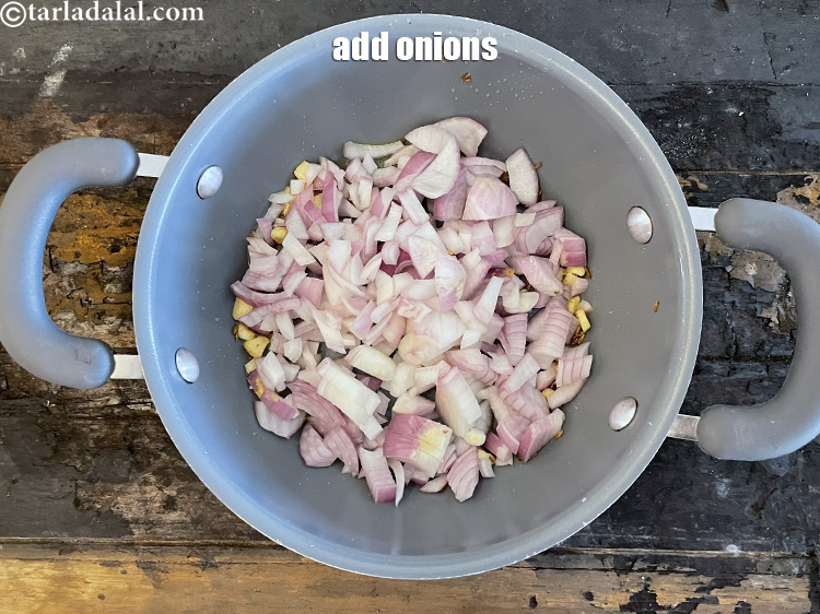 Step 10 – Add&nbsp;<meta charset="UTF-8" />1 cup&nbsp;<a href="glossary-chopped-onions-722i">chopped onions</a>.