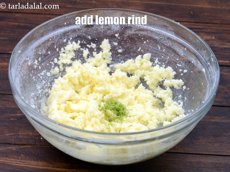 Step 10 – Add 1 tsp&nbsp;<a href="https://www.tarladalal.com/glossary-lemon-rind-958i">lemon rind</a>.
