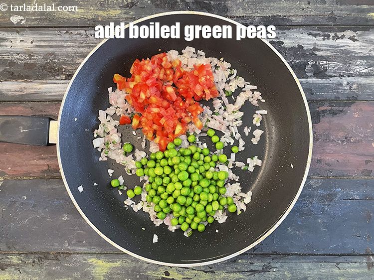 Step 14 – Add&nbsp;<meta charset="UTF-8" />1/2 cup&nbsp;<a href="glossary-boiled-green-peas-1078i">boiled green peas</a>.