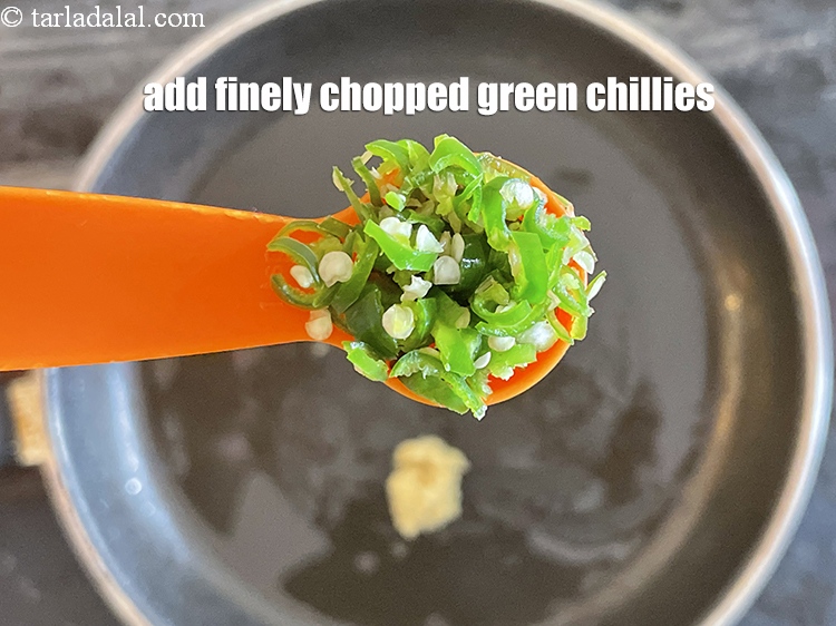 Step 19 – Add&nbsp;<meta charset="UTF-8" />1 tsp&nbsp;finely&nbsp;<a href="glossary-chopped-green-chilli-820i">chopped green chillies</a>.
