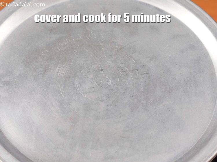 Step 9 – Mix well and cover and cook on medium flame for 5 minutes.