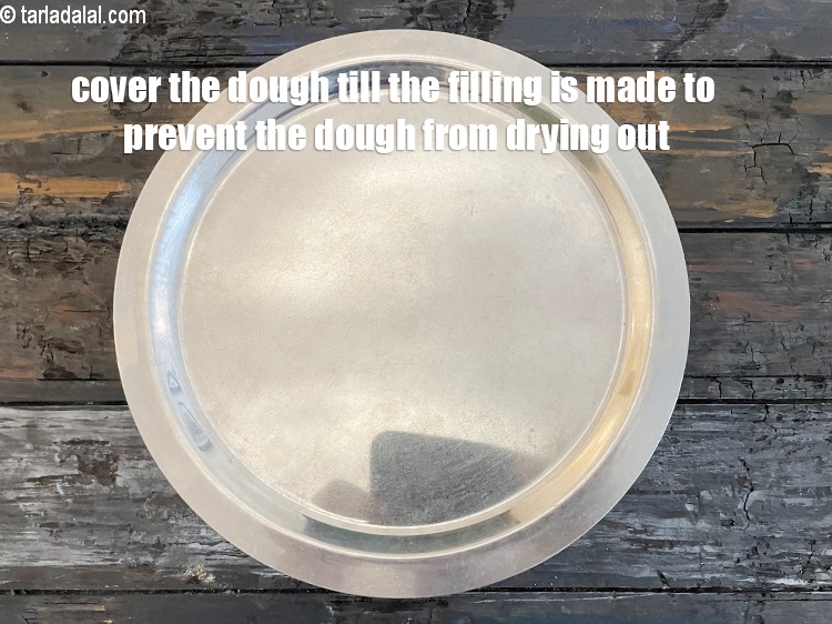 Step 10 – Cover the dough till the filling is made. This prevents the dough from drying out …