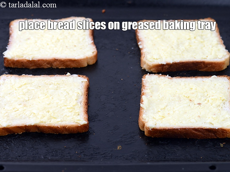 Step 8 – Place the bread slices on a greased baking tray.