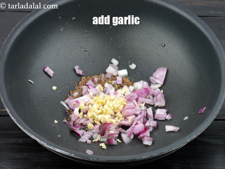 Step 9 – Add the 1 tsp&nbsp;<a href="https://www.tarladalal.com/glossary-chopped-garlic-790i">chopped garlic (lehsun)</a>