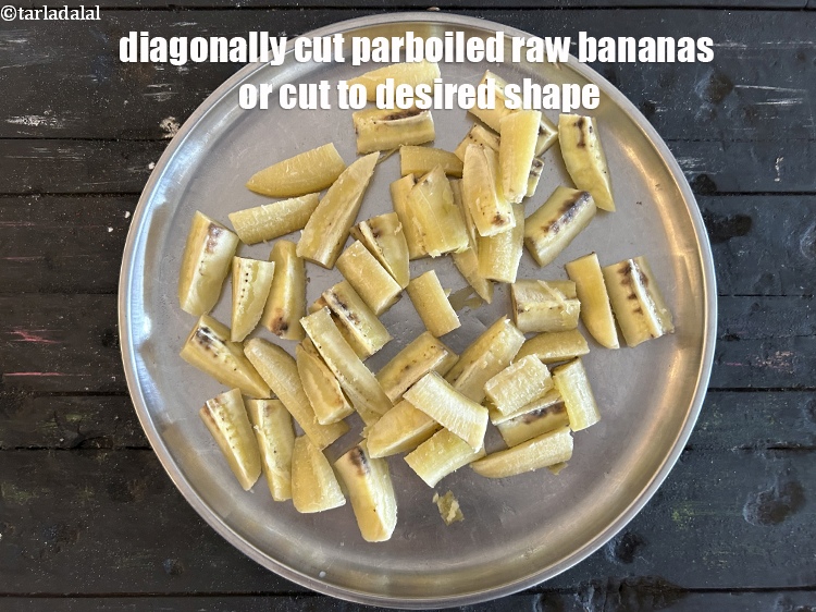 Step 9 – Diagonally cut parboiled raw bananas or cut to desired shape.&nbsp;You can cut them into thick …