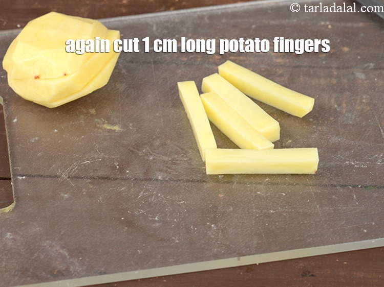 Step 11 – Lay down the thick slices on the chopping board and again cut 1 cm long …