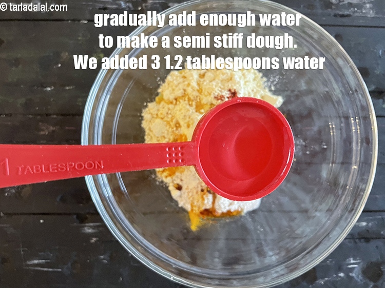Step 9 – Gradually add enough water to make a semi stiff dough. We added 1&nbsp;tablespoon water and …
