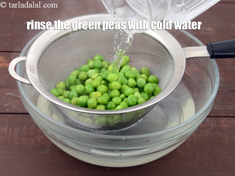 Step 20 – Rinse the green peas with cold water to stop further cooking and ensure maximum freshness.