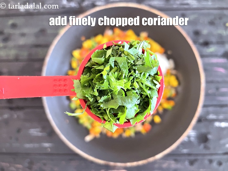 Step 17 – Add&nbsp;<meta charset="UTF-8" />2 tbsp&nbsp;finely&nbsp;<a href="glossary-chopped-coriander-783i">chopped coriander (dhania)</a>.