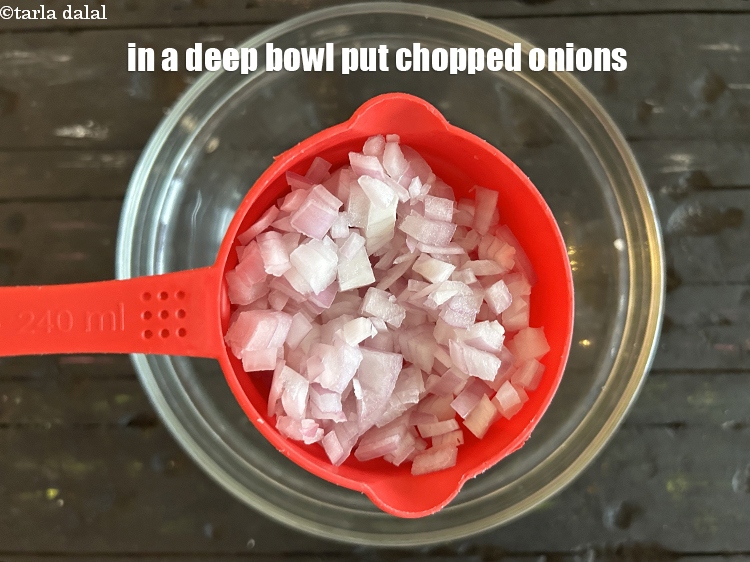 Step 11 – <meta charset="UTF-8" />In a deep bowl put&nbsp;3/4 cup&nbsp;<a href="glossary-chopped-onions-722i">chopped onions</a>.&nbsp;