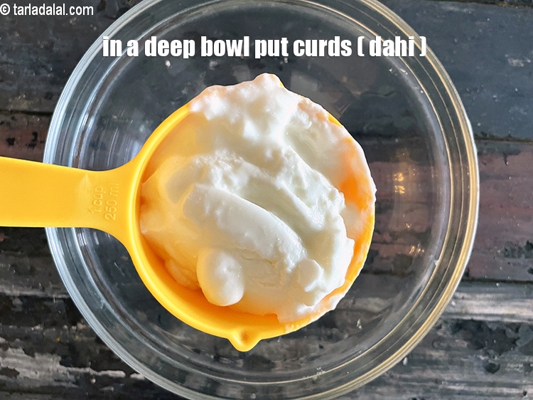 Step 14 – In a deep bowl put&nbsp;<meta charset="UTF-8" />1 cup&nbsp;<a href="glossary-curd-dahi-yogurt-yoghurt-383i">curds (dahi)</a>.