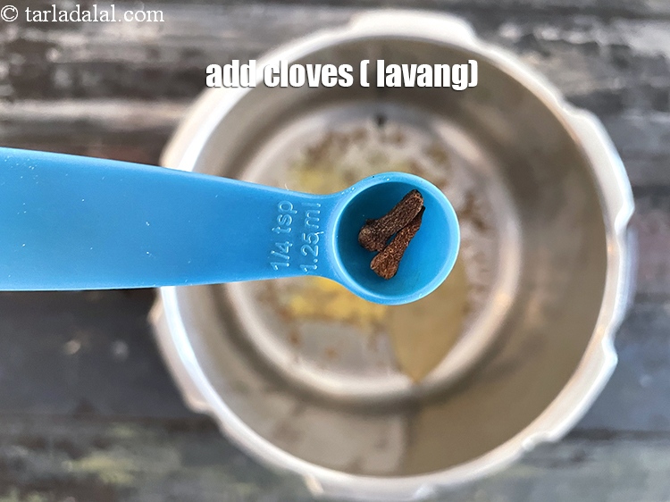 Step 18 – Add&nbsp;<meta charset="UTF-8" />2&nbsp;<a href="glossary-cloves-laung-lavang-322i">cloves (laung / lavang)</a>.
