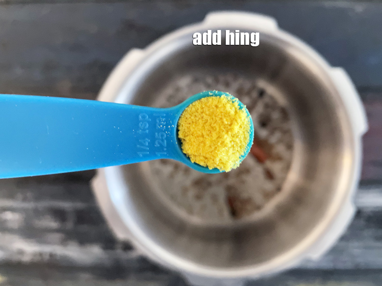 Step 25 – Add&nbsp;<meta charset="UTF-8" />a pinch&nbsp;<a href="glossary-asafoetida-hing-113i">asafoetida (hing)</a>.